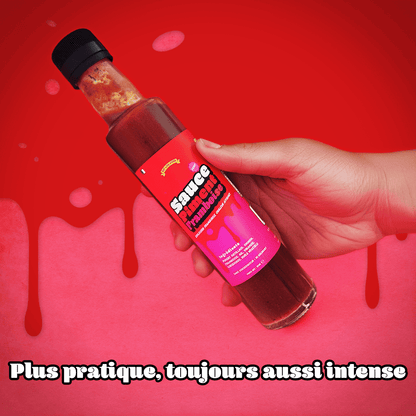 La Bouteille de sauce Piment/pimentée à la framboise 270g dans un décor